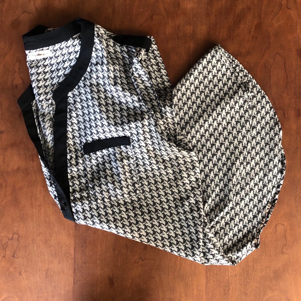 Sleeveless partial button up